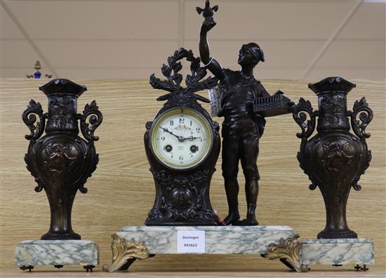 A late 19th century French bronzed spelter figural three piece clock garniture, on marble plinths height 40cm